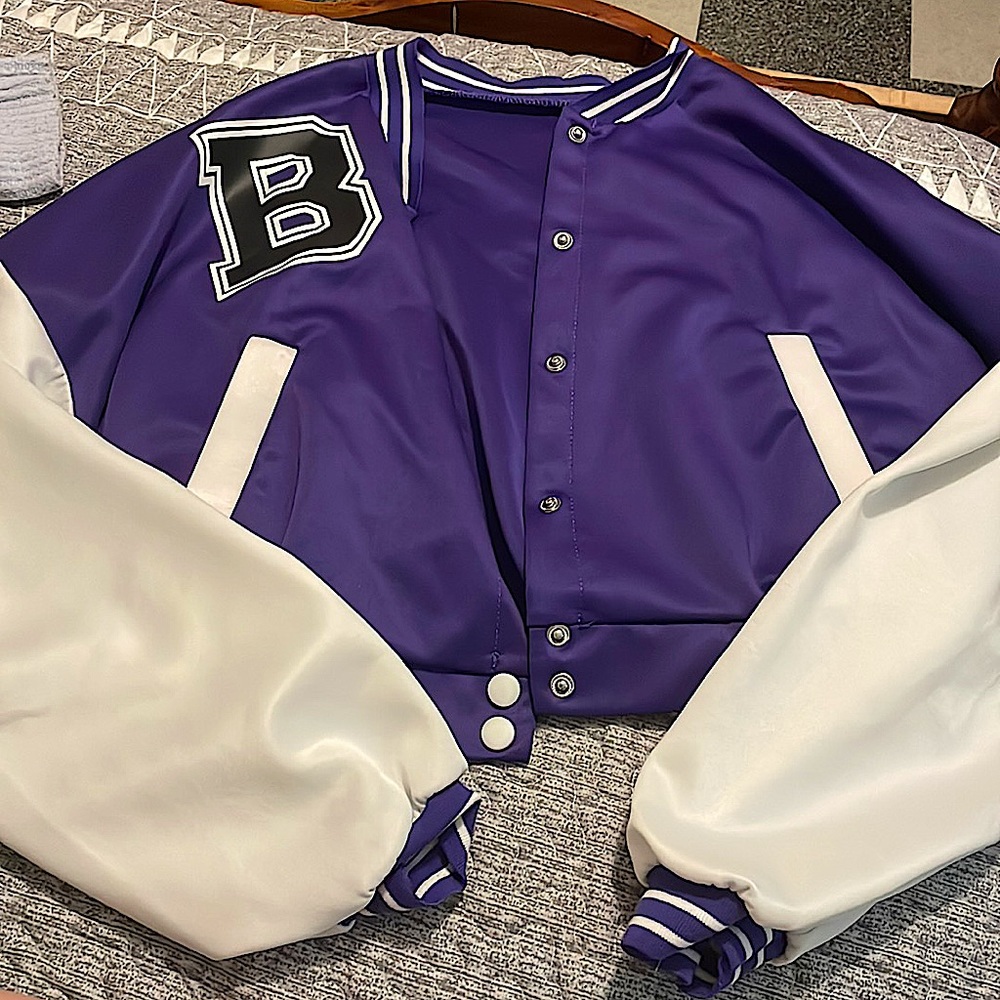 This is a cropped jacket, size, small, dark purple, and white.